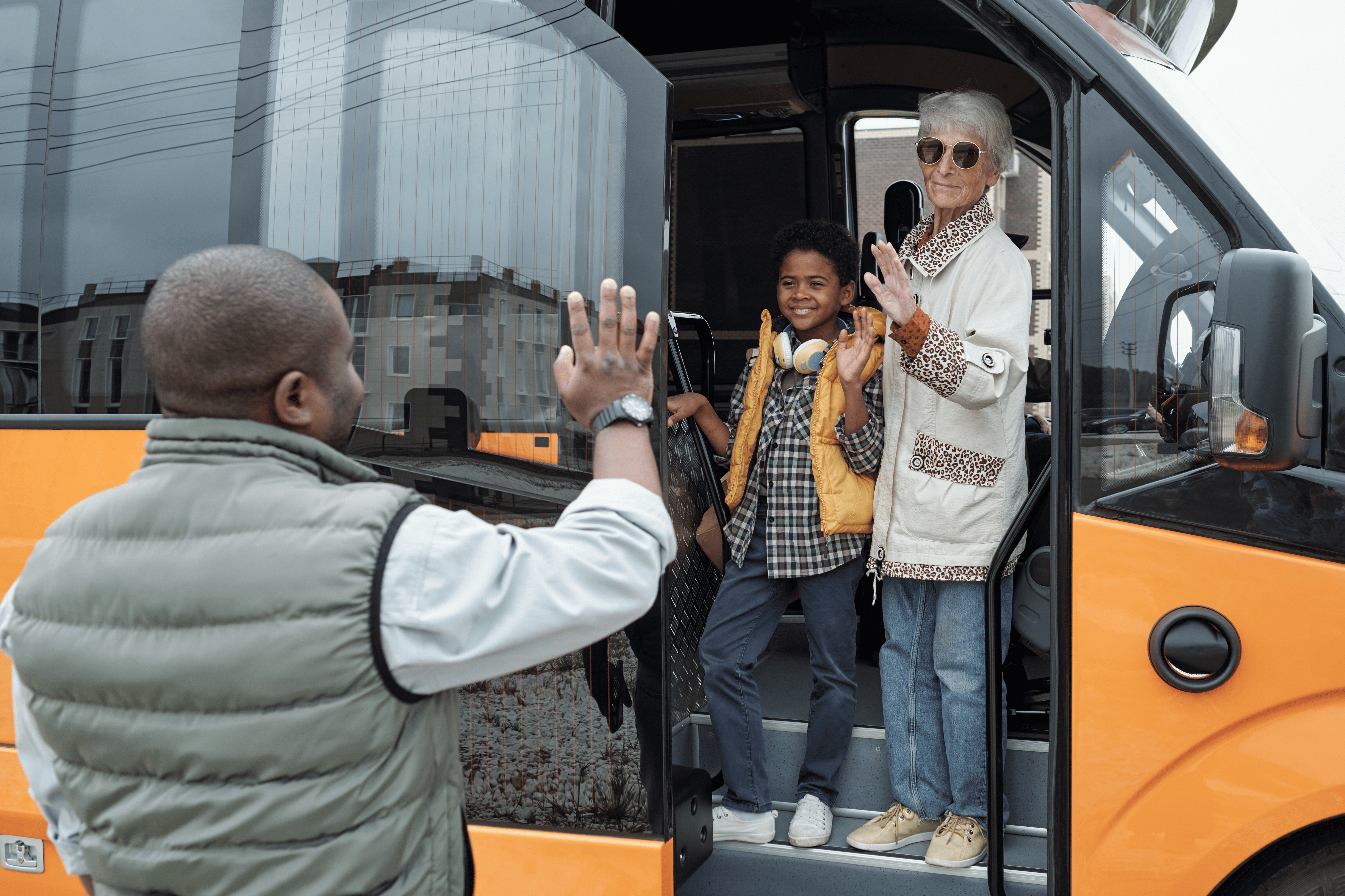 Students boarding a safe school minibus near JFK Airport in Queens